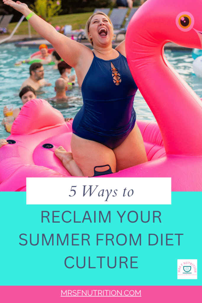 Woman enjoying summer in swimming costume, in inflatable flamingo in pool